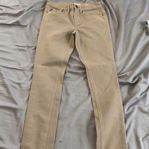 Tan Stacked skinny jeans